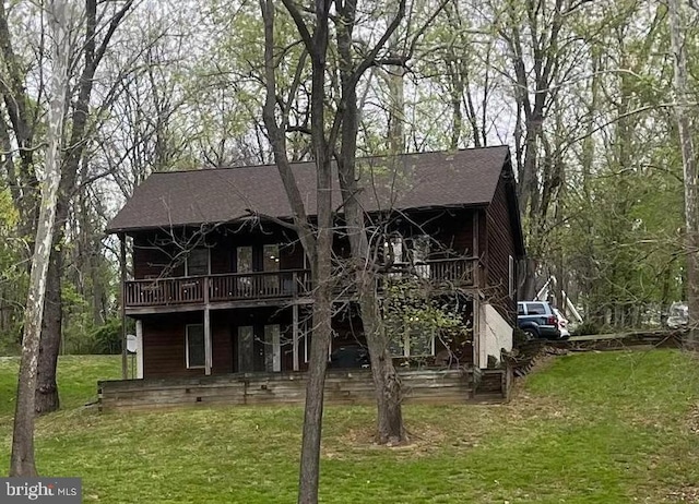 173 Riverside Dr, Harpers Ferry, WV 25425 - back of property featuring a deck, a yard, and roof with shingles