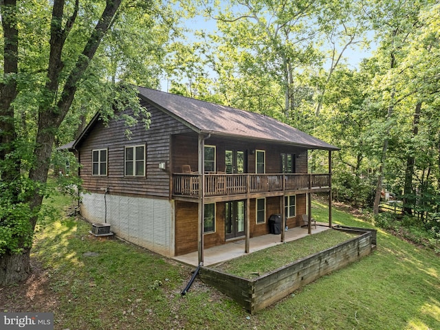 173 Riverside Dr, Harpers Ferry, WV 25425 - back of property with a patio, a lawn, french doors, a wooden deck, and central AC