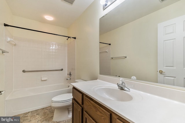 full bath featuring vanity, bathtub / shower combination, toilet, and visible vents