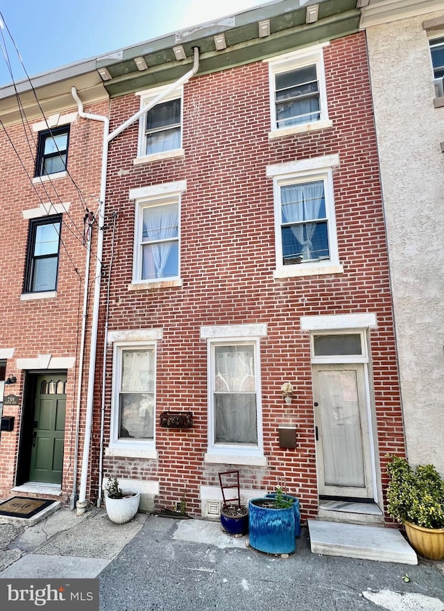 2102 E Dauphin St, Philadelphia, PA 19125 - townhome / multi-family property featuring brick siding