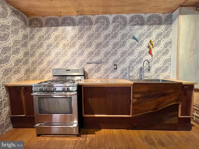2102 E Dauphin St, Philadelphia, PA 19125 - kitchen with stainless steel range with gas cooktop and wood finished floors