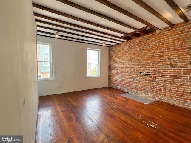 2102 E Dauphin St, Philadelphia, PA 19125 - unfurnished room with hardwood / wood-style floors, beam ceiling, and brick wall