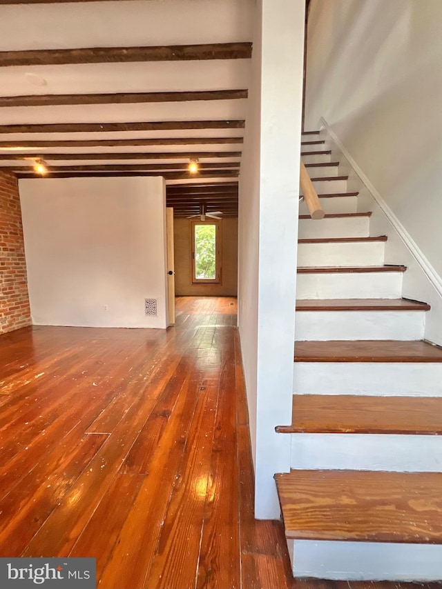 2102 E Dauphin St, Philadelphia, PA 19125 - staircase with wood-type flooring and beamed ceiling