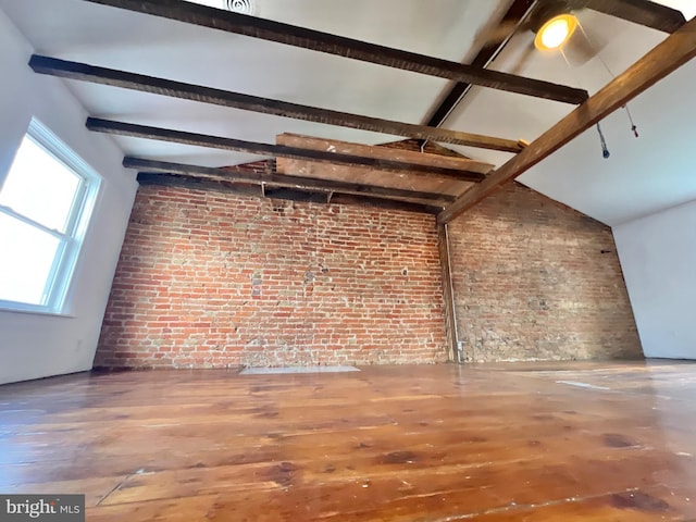 2102 E Dauphin St, Philadelphia, PA 19125 - unfurnished living room with brick wall and wood finished floors