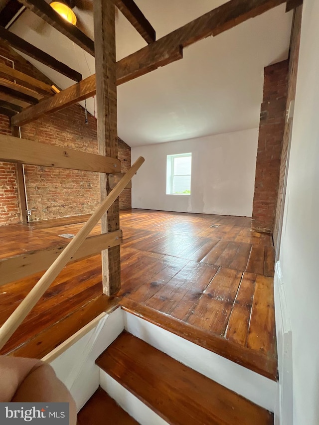 2102 E Dauphin St, Philadelphia, PA 19125 - stairs featuring hardwood / wood-style floors and brick wall