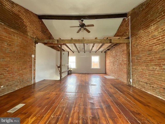 2102 E Dauphin St, Philadelphia, PA 19125 - unfurnished living room with brick wall, beamed ceiling, wood-type flooring, and a ceiling fan