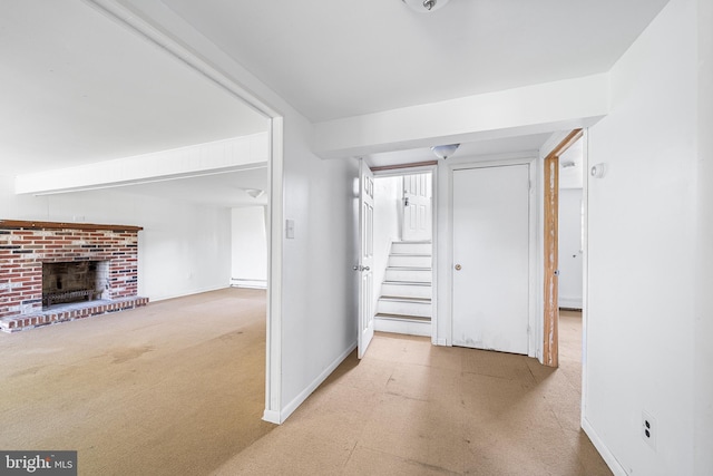 interior space with stairway, baseboards, and carpet flooring