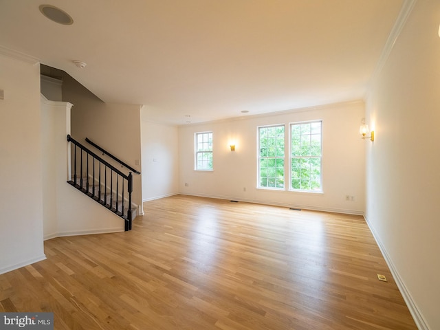 70 River Ln, Delanco, NJ 08075 - empty room featuring ornamental molding, light wood finished floors, stairway, baseboards, and a smoke detector