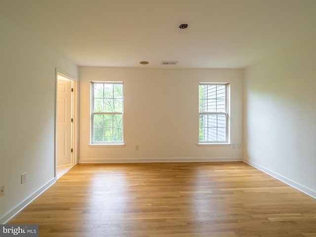 70 River Ln, Delanco, NJ 08075 - spare room featuring plenty of natural light, light wood-style flooring, and baseboards