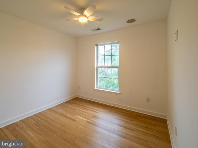70 River Ln, Delanco, NJ 08075 - empty room featuring light wood finished floors, a ceiling fan, and baseboards