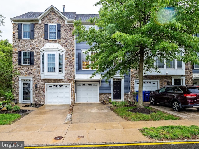 70 River Ln, Delanco, NJ 08075 - multi unit property featuring stone siding, driveway, and a garage