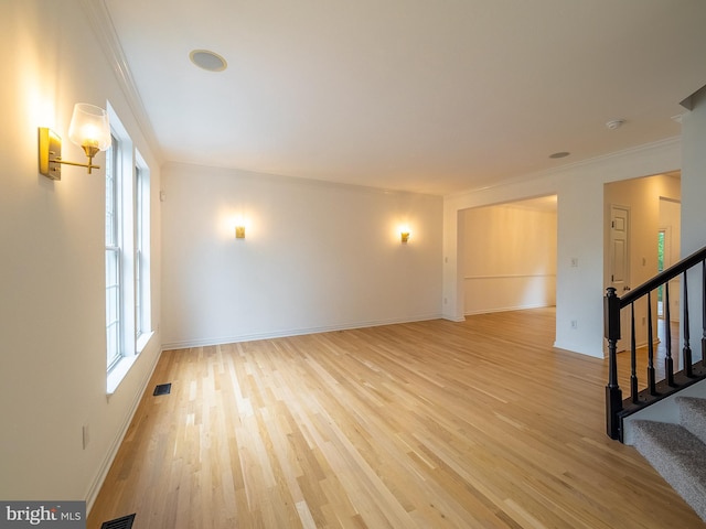 70 River Ln, Delanco, NJ 08075 - unfurnished room with light wood-style floors, stairway, ornamental molding, and baseboards