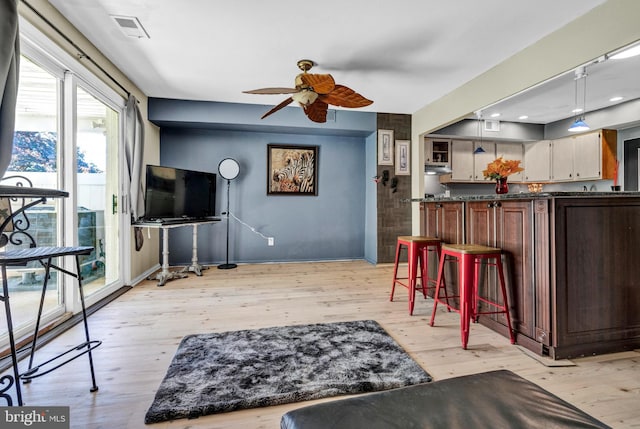 1806 Crest Dr, Coatesville, PA 19320 - living area featuring light wood-style floors, ceiling fan, recessed lighting, and visible vents