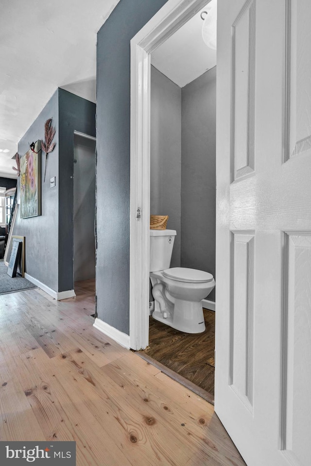 1806 Crest Dr, Coatesville, PA 19320 - bathroom with baseboards, wood finished floors, and toilet