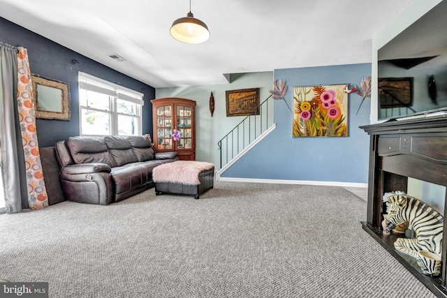 1806 Crest Dr, Coatesville, PA 19320 - carpeted living room featuring baseboards, stairs, and visible vents