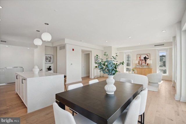 923 V St NW Unit 601, Washington, DC 20001 - dining space featuring light wood-style flooring and recessed lighting