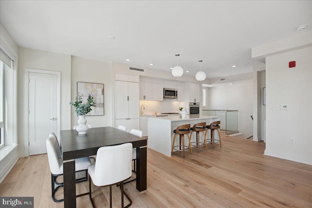 923 V St NW Unit 601, Washington, DC 20001 - dining space featuring light wood finished floors and recessed lighting