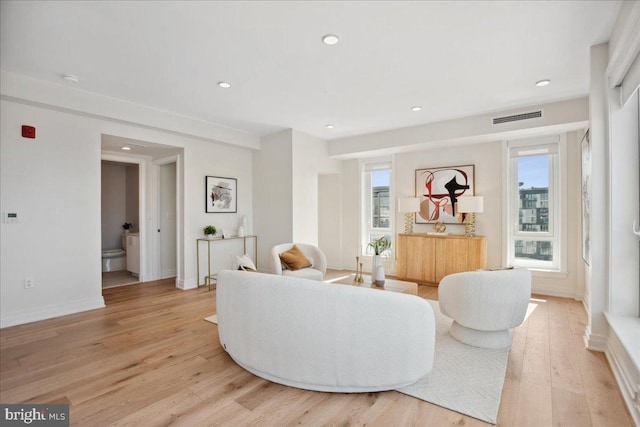 923 V St NW Unit 601, Washington, DC 20001 - living area with healthy amount of natural light, light wood finished floors, and recessed lighting