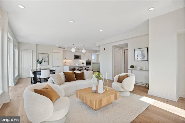 923 V St NW Unit 601, Washington, DC 20001 - living room with light wood-style flooring and recessed lighting