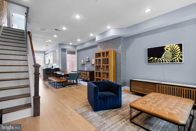 building lobby with stairs and recessed lighting