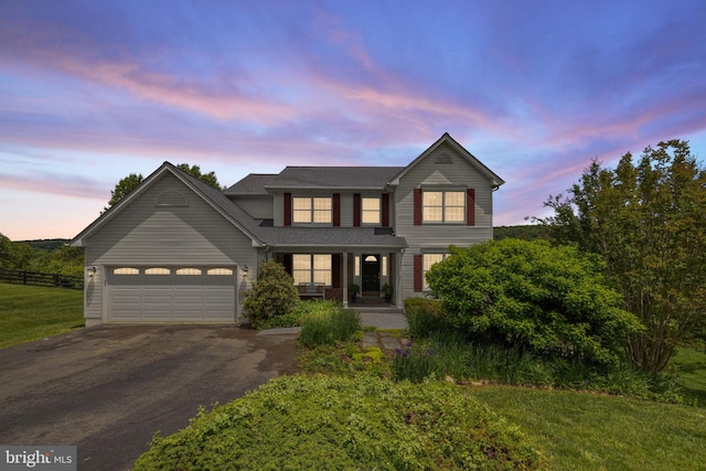 5722 Pond View Ln, Broad Run, VA 20137 - traditional home featuring driveway, a porch, and a garage