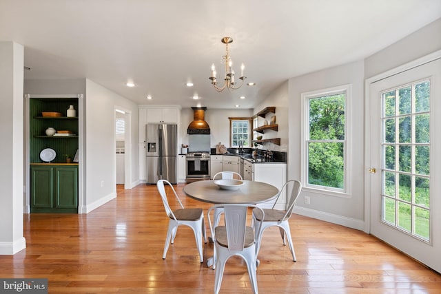 5722 Pond View Ln, Broad Run, VA 20137 - dining space with light wood-style floors, a chandelier, baseboards, and recessed lighting