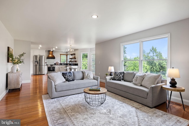 5722 Pond View Ln, Broad Run, VA 20137 - living area with baseboards, wood finished floors, a chandelier, and recessed lighting