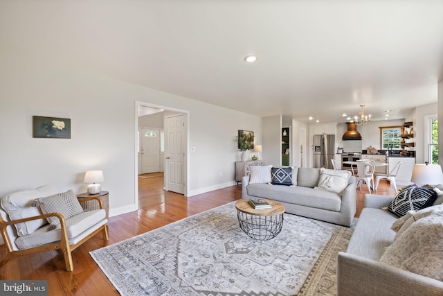 5722 Pond View Ln, Broad Run, VA 20137 - living area with a chandelier, light wood-style floors, baseboards, and recessed lighting