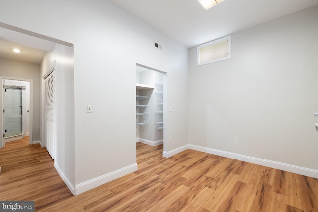 5722 Pond View Ln, Broad Run, VA 20137 - spare room with light wood-style flooring, baseboards, and recessed lighting