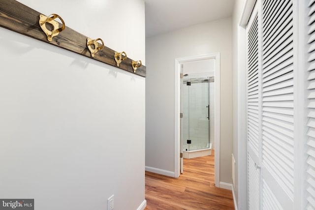 5722 Pond View Ln, Broad Run, VA 20137 - hallway featuring baseboards and light wood-type flooring