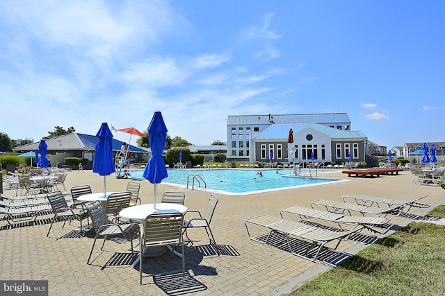 201 S Heron Dr Unit 11E, Ocean City, MD 21842 - community pool featuring a patio area