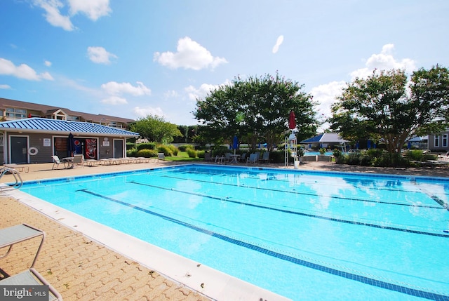 pool featuring a patio area