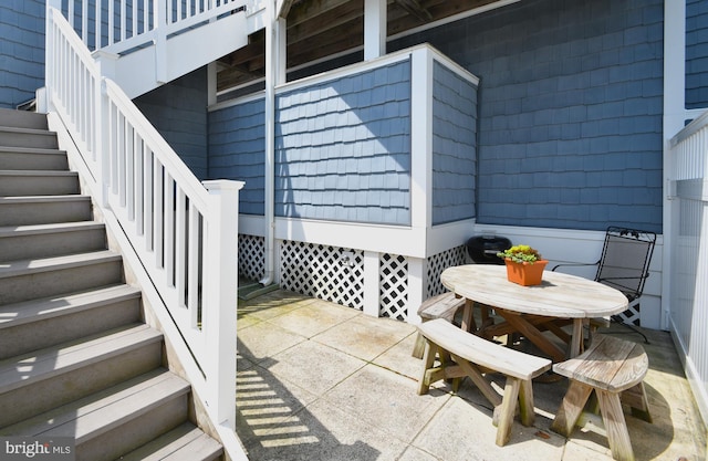 201 S Heron Dr Unit 11E, Ocean City, MD 21842 - view of patio featuring stairway and outdoor dining space