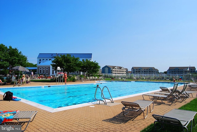 201 S Heron Dr Unit 11E, Ocean City, MD 21842 - community pool featuring fence and a patio area