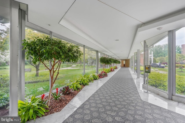 4201 Cathedral Ave NW Unit 616W, Washington, DC 20016 - unfurnished sunroom featuring plenty of natural light and marble finish floors