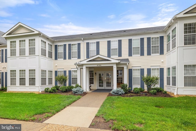 6704 Holly Farm Ln Unit 203, New Baltimore, VA 20187 - view of front of home featuring french doors and a front yard