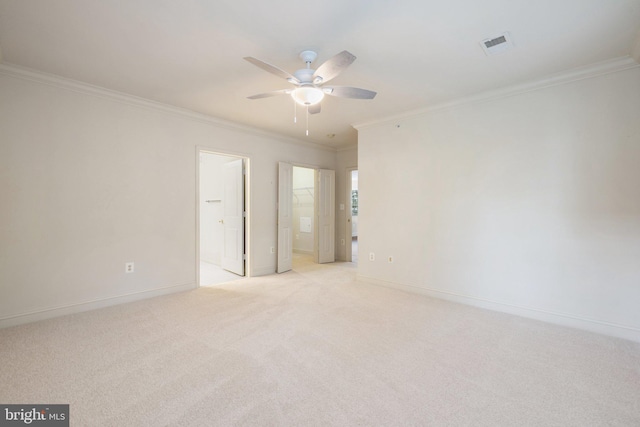 6704 Holly Farm Ln Unit 203, New Baltimore, VA 20187 - spare room featuring crown molding, a ceiling fan, light colored carpet, and baseboards