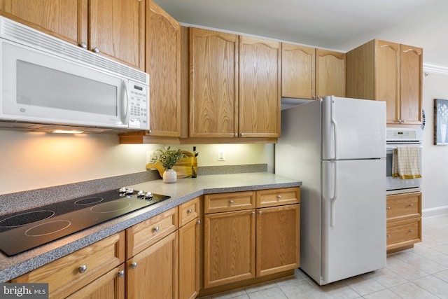 6704 Holly Farm Ln Unit 203, New Baltimore, VA 20187 - kitchen with white appliances and light tile patterned floors