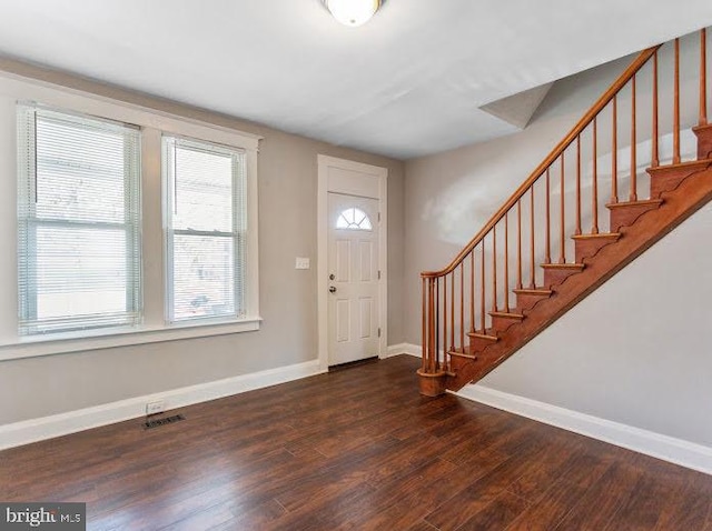 65 N Monastery Ave, Baltimore, MD 21229 - entrance foyer with a healthy amount of sunlight, baseboards, and stairway