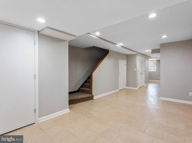 65 N Monastery Ave, Baltimore, MD 21229 - basement with recessed lighting, baseboards, and stairway