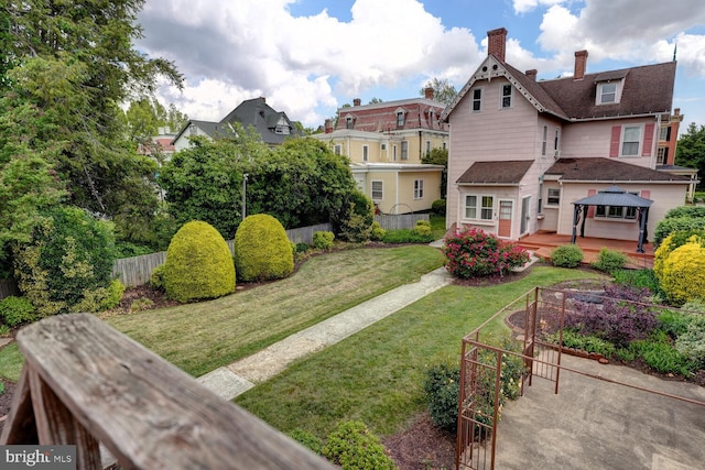 view of yard featuring a gazebo and a deck