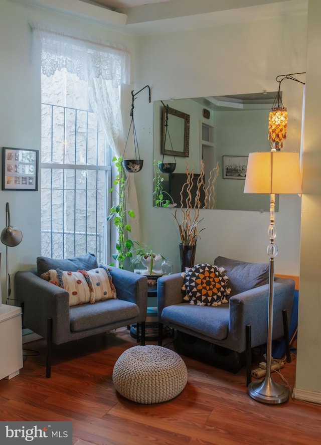 sitting room with wood finished floors