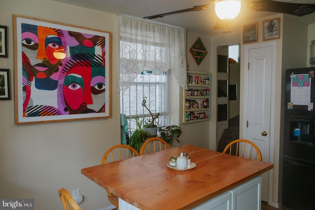 dining area featuring a ceiling fan