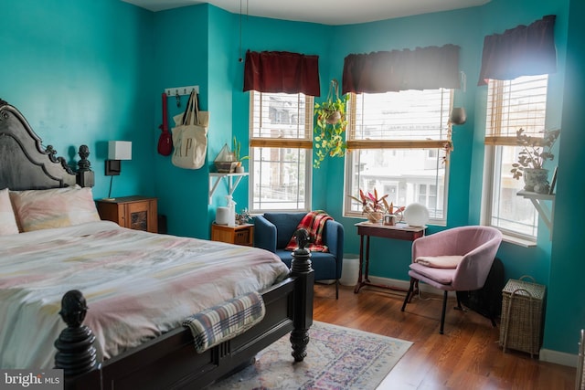 bedroom featuring wood finished floors
