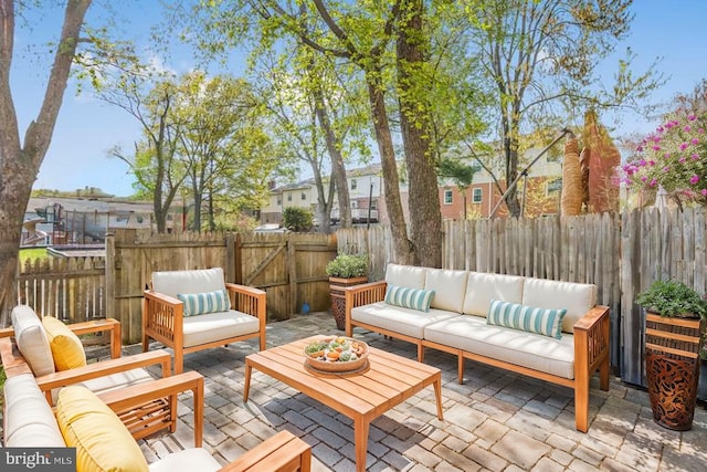 12714 Harborview Ct, Woodbridge, VA 22192 - view of patio featuring a fenced backyard and outdoor lounge area
