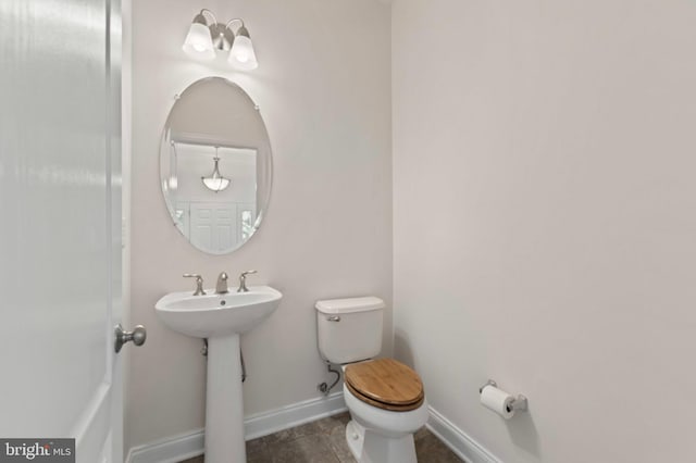 4102 Chariot Way, Upper Marlboro, MD 20772 - bathroom with baseboards, toilet, a sink, and tile patterned floors