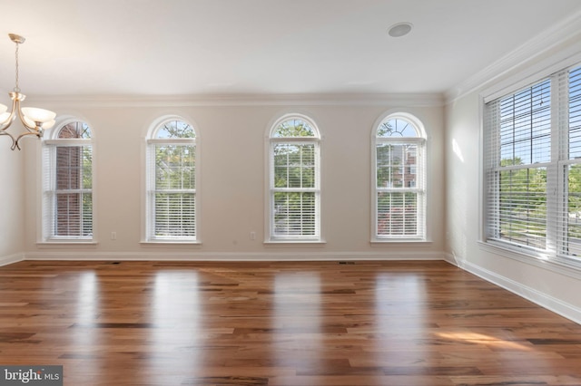 4102 Chariot Way, Upper Marlboro, MD 20772 - spare room featuring a chandelier, wood finished floors, crown molding, and baseboards