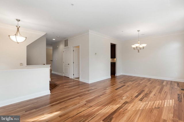 4102 Chariot Way, Upper Marlboro, MD 20772 - unfurnished room with a chandelier, light wood finished floors, baseboards, and crown molding