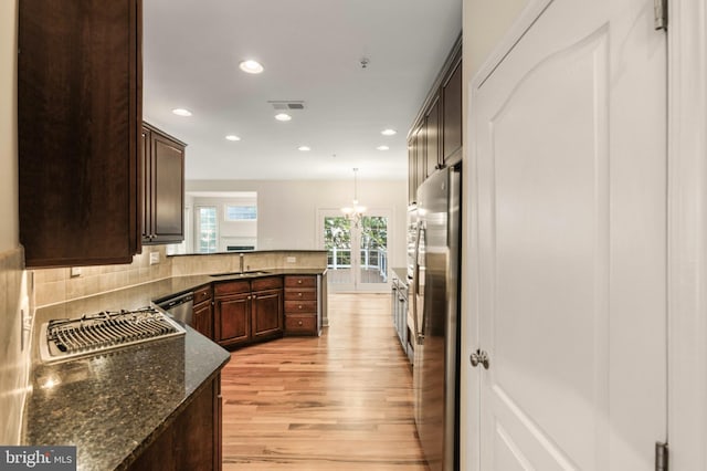 4102 Chariot Way, Upper Marlboro, MD 20772 - kitchen featuring stainless steel appliances, light wood-style flooring, recessed lighting, dark brown cabinetry, and a sink