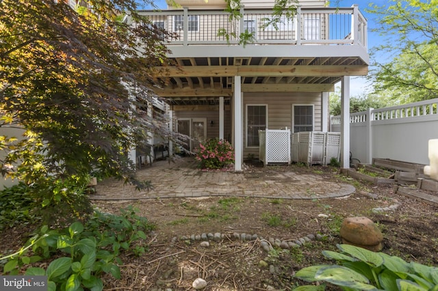 4102 Chariot Way, Upper Marlboro, MD 20772 - rear view of property featuring a patio area and a wooden deck